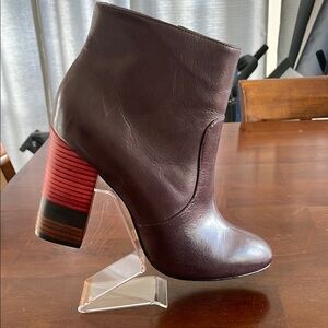 Elegant Purple Ankle Boots with Red black and brown accent heels.